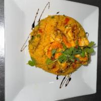 Arroz con Camarones · Rice with shrimp.