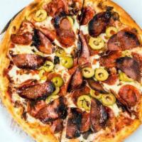 Tutto Carne Pizza · Fresh mozzarella, bacon, salami, pepperoni, green olives and spicy San Marzano tomato sauce.