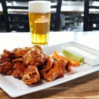 The Wings · Traditional or Boneless wings cooked to perfection and tossed in your choice of Buffalo, gar...