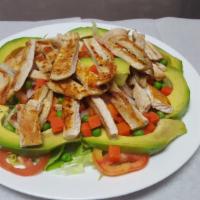 Ensalada de Pollo · Chicken salad, with lettuce,tomatoes,onions, mix vegetables and grilled chicken breast fille...