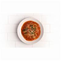 Braised Short Rib Ravioli · Tomato-butter sauce with mushrooms, onions, red wine, parmesan 