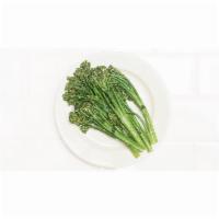 Broccolini · Sautéed in garlic and olive oil with fresh herbs.