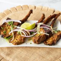 Lamb Chops · Marinated lamb chops cooked in clay oven.