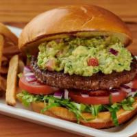 Beyond Burger · Grilled Plant Based burger with Lettuce, Tomato, Pickles and Red Onions on a toasted bun.  C...