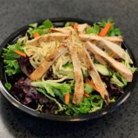 Asian Sesame Chicken Salad · Marinated all white chicken, sliced cucumbers, snap peas, fresh julienne carrots and Yaki So...