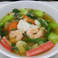 Seafood Noodle Soup · Shrimp, scallop, calamari and crab meat and mixed vegetables