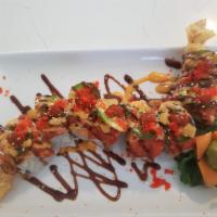 Fire Dragon Roll · Tempura shrimp, kani, cucumber topped with spicy tuna, jalapeno, eel sauce, spicy mayo, hot ...
