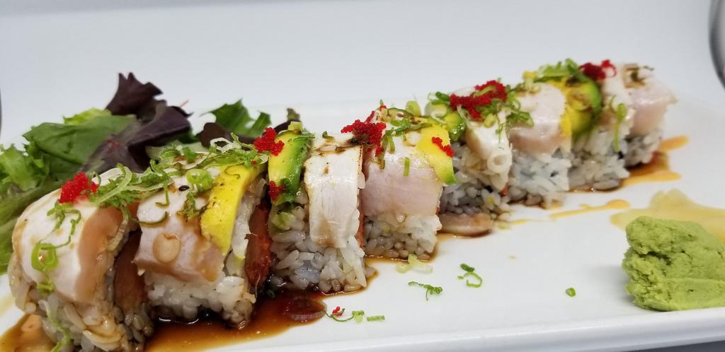Superbowl Roll · Spicy Tuna, Salmon topped with Yellowtail, Avocado, wasabi ponzu sauce.