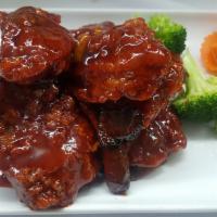 Orange Beef · Spicy. crispy chunk of steak, orange peel flavor, Broccoli