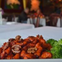 Beijing Chicken · Chunks of white meat chicken in sweet and smoky beijing sauce and glazed walnut.