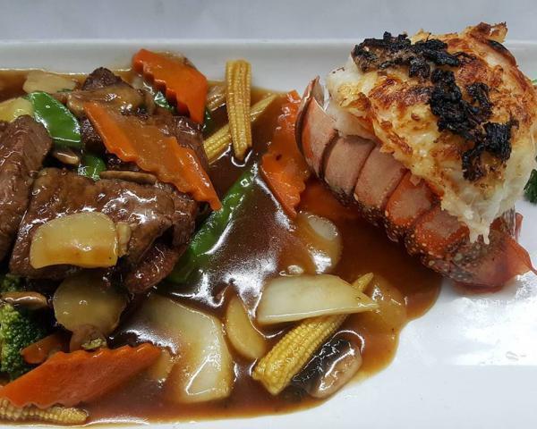 Chinese Surf and Turf · Filet mignon, 5 oz. lobster tail and fresh vegetables.