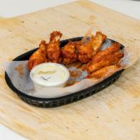 Fresh Jumbo Wings · Hot, mild, BBQ, or lemon herb. Served with ranch dressing. Breaded jumbo wings are available.