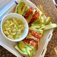 Avocado Decker · Avocado and bacon. Served with lettuce, tomato and mayonnaise. Served with choice of side.