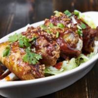 Spicy Wing · Served with Sriracha-tamarind sauce.