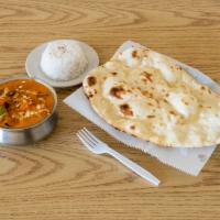 Chicken Tikka Masala · Tandoori chicken (boneless) cooked in a sauce of tomatoes, made with aromac herbs cooked to ...