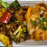 S2. Shrimp and Pork Hunan Style · Shrimp in chili sauce and pork in black bean sauce on the other side. Hot and spicy.