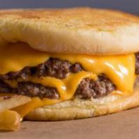 Cheesy Burger · 4 slices of melted American cheese and 2 beef patties cooked-to-order, sandwiched between an...