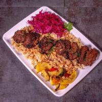 Beef Shish Kebab · Special marinated beef tenderloin served with rice. Gluten free.