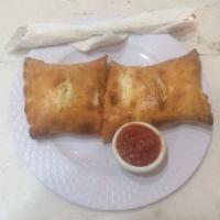 Meat Lover's Stromboli · Filled with Italian sausage, pancetta, pepperoni, mozzarella cheese and pizza sauce.