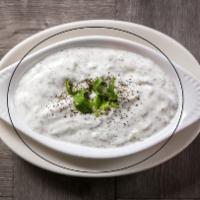 Must O’ Kheyar · Yogurt mixed with chopped cucumber & mint