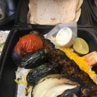  Beef Koobideh (Lunch Special) · 1 skewer Beef Koobideh, With a Side of Rice & Grilled Veggies, Lemon, Butter, Sumac, Bread, ...