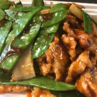 71. Quart of Chicken with Snow Peas · With white rice.
