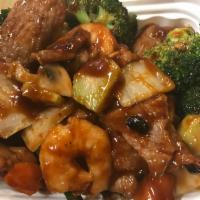 H14. Hunan 2 Delicacies · Fresh Hunan beef on one side and jumbo shrimp in spicy sauce, served on the other side. With...
