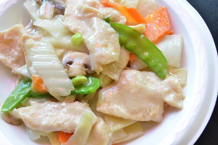 2. Moo Go Gai Pan Combination · Served with roast pork fried rice and egg roll.