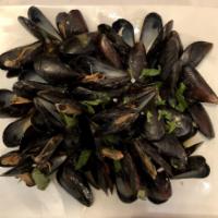Mussels · Fresh cultivated mussels, steamed and seasoned in a white wine garlic and herb broth or in a...