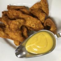 Golden Fried Chicken Fingers · Served with a side of honey mustard sauce.