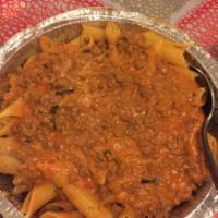 Penne Bolognese · Freshly ground hearty meat sauce with a touch of cream.