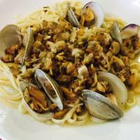 Linguine Clam Sauce · Chopped baby clams sauteed with fresh garlic and oil with whole shelled little neck clams.