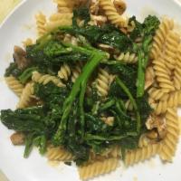 Fusilli Casalinga · Corkscrew shaped pasta tossed with fresh broccoli rabe and grilled chicken strips, sauteed i...