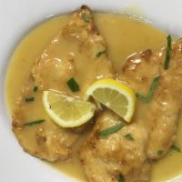 Veal Francese · Battered breast of veal sauteed in lemon, butter and white wine.