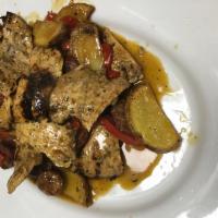 Scarpiello · Juicy strips of charbroiled chicken breasts with fire roasted peppers, herb potatoes and gri...