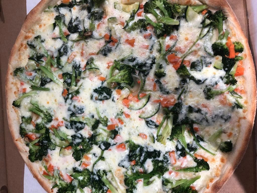 Vegetable Pizza · Sautéed in garlic oil broccoli spinach zucchini Mozzarella cheese 