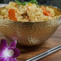 Pineapple Fried Rice · Choice of meat, jasmine rice, egg, pineapple, onions, carrot, cashew nut, curry powder and c...