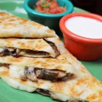 Quesadilla De Hongos · Mushroom. Chihuahua cheese, queso fresco and Monterrey jack cheese melted between a grilled ...