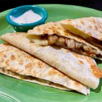 Quesadilla de Camarón · Shrimp. Chihuahua cheese, queso fresco and Monterrey jack cheese melted between a grilled fl...