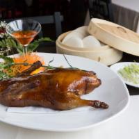 A16. Peking Duck  · Served with bun.