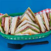Club Sandwich · Turkey, ham, bacon, lettuce, tomato, American and Swiss cheese, mayo on toasted white or whe...