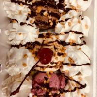 Trio Banana Split Ice Cream · Chocolate, strawberry and vanilla ice cream, with bananas, topped with strawberry, chocolate...