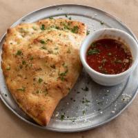 Colossal Calzone · We start with marinara sauce and a ricotta/mozzarella blend. Includes choice of 2 ingredients.