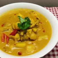 CK9.Curry Chicken 咖喱鸡 · Curry seasoned dish. 