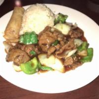 Pepper Steak · Tender beef stir fried with green bell peppers and onions in brown sauce.