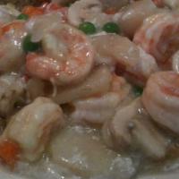 Shrimp with Lobster Sauce · Stir fried with green peas, carrots and eggs in creamy white sauce.