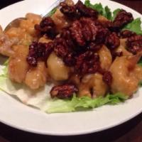 Shrimp Walnut · Crispy battered shrimp tossed in creamy sauce topped with sugar coated walnuts.