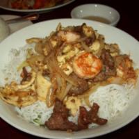 Bun Fortune · Vermicelli with shrimps, chicken, and beef combination. Served over shredded carrots, cucumb...