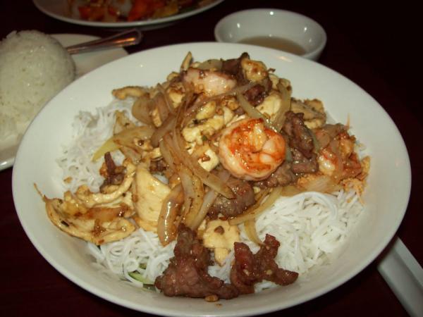 Bun Fortune · Vermicelli with shrimps, chicken, and beef combination. Served over shredded carrots, cucumber, lettuce, bean sprouts, chopped peanuts and side of fish sauce.