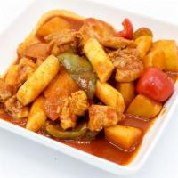 Jjim Dak · Sweet and spicy chili braised chicken, bell peppers, onion, rice cake and potato. Spicy.